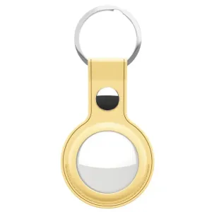 KeyBudz pastellgula AirTag-nyckelringshållare i läder med silverfärgad ring på vit bakgrund