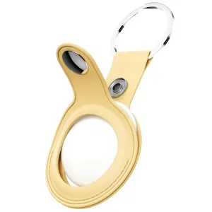 KeyBudz gul AirTag-nyckelringhållare i läder med silverring och synlig AirTag