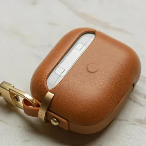 Moshi Pebbo Luxe för AirPods 3, skyddsfodral i karamellbrunt med guldfärgad karbinhake