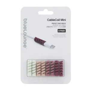 Bluelounge CableCoil Mini-kabelskyddsförpackning med blandade spiraldelar i ett genomskinligt fönster.
