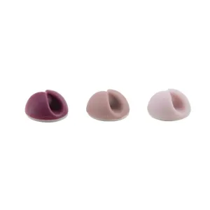 Bluelounge CableDrop Mini-kabelhållare i ombré blush, visade som tre kupolformade kabelhållare