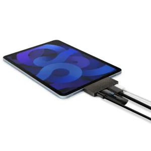 Twelve South StayGo mini USB-C-hub tilsluttet en tablet med flere kabler til ekstra porte