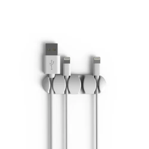 Bluelounge Cable Drop Multi vit kabelhållare som håller tre laddkablar på en bordsyta