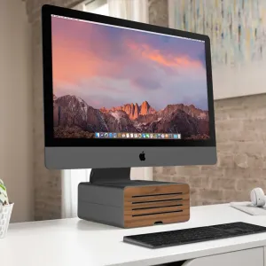 Soporte HiRise Pro de Twelve South para iMac en gris metalizado, que eleva un iMac con almacenamiento oculto en el escritorio.