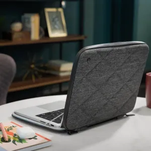 Funda rígida protectora Twelve South SuitCase para MacBook Pro de 16" con exterior acolchado gris y asa