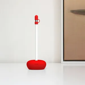 Support en silicone Baseus pour Apple Pencil, en rouge, qui maintient le stylet à la verticale et l’empêche de rouler.