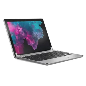 Teclado de aluminio Brydge para Surface Pro en color plata, mostrado acoplado a la tableta con panel táctil