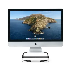 Apple iMac på det svarta Twelve South Curve Riser-skärmstället med en perforerad hylla