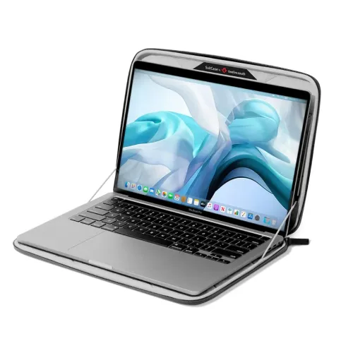 Funda rígida gris Twelve South SuitCase para MacBook Pro/Air de 15"/16", mostrada abierta con un portátil en su interior