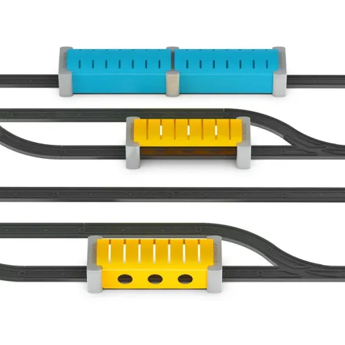 Insertos modulares de Intelino Station & Tunnel Kit en amarillo y azul sobre vías de tren de juguete