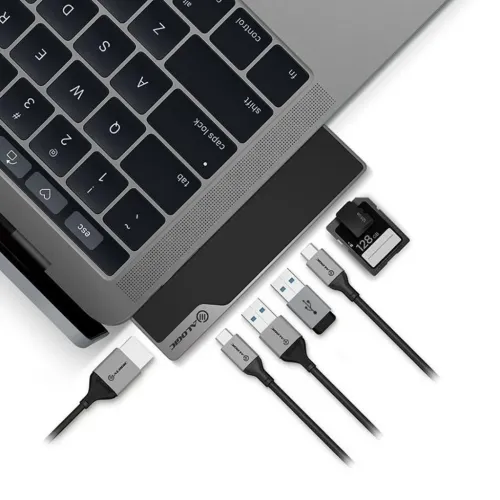 ALOGIC Ultra USB-C Dock NANO Gen 2 conectado a un portátil con cables USB y tarjetas SD sobre fondo blanco